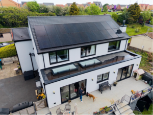 White house with solar panels on roof in Harrogate